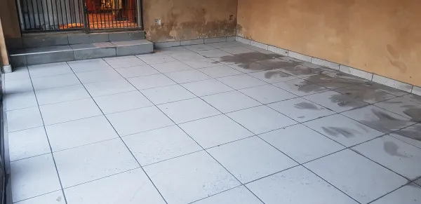 Just laid tiles, still cleaning